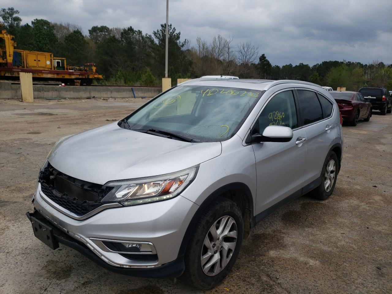Photo 2 from auction – 2015 HONDA CR-V EXL with VIN 2HKRM3H74FH531048