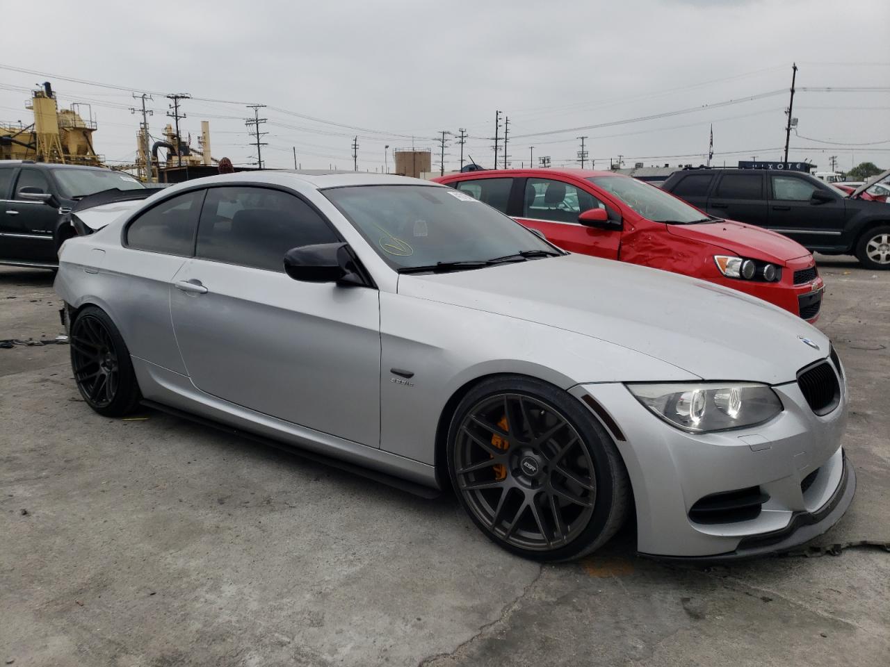 BMW 335 IS 2011 with VIN WBAKG1C57BE618050 - Photo from auction