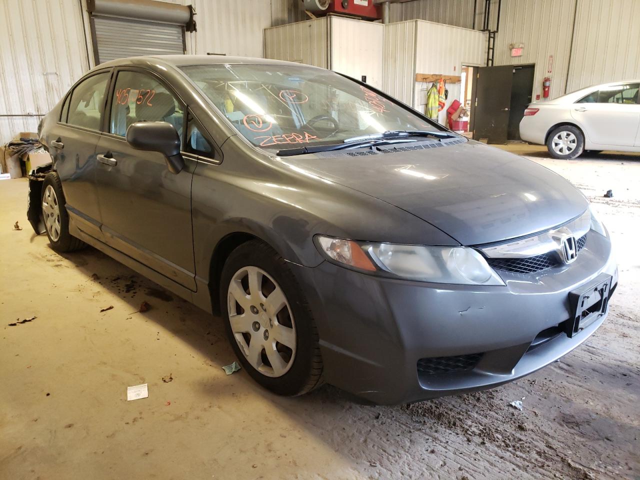 HONDA CIVIC LX 2011 with VIN 2HGFA1F57BH531650 - Photo from auction
