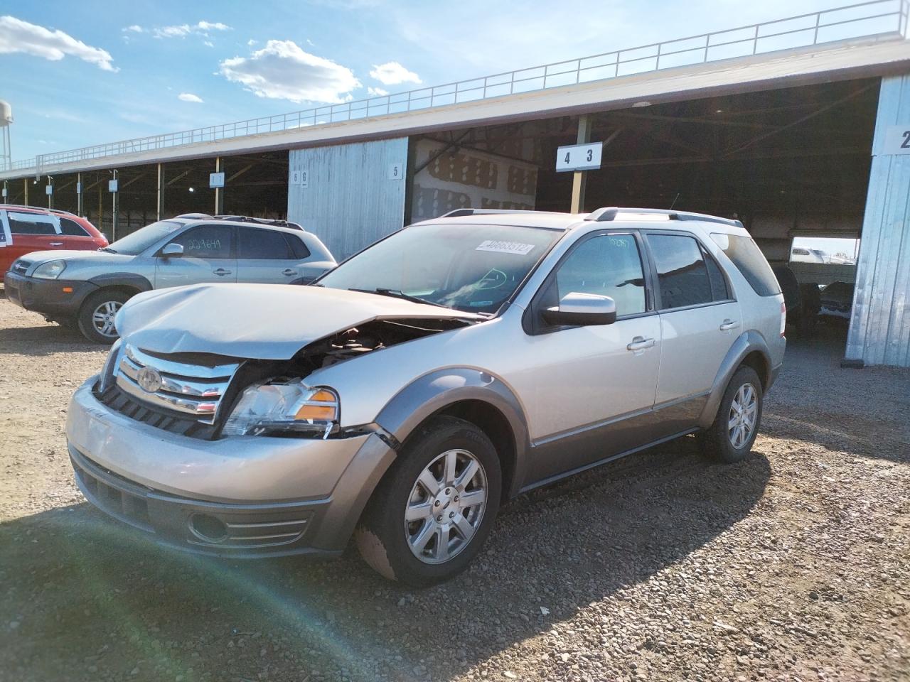 Photo 2 from auction – 2008 FORD TAURUS X S with VIN 1FMDK02W68GA35959