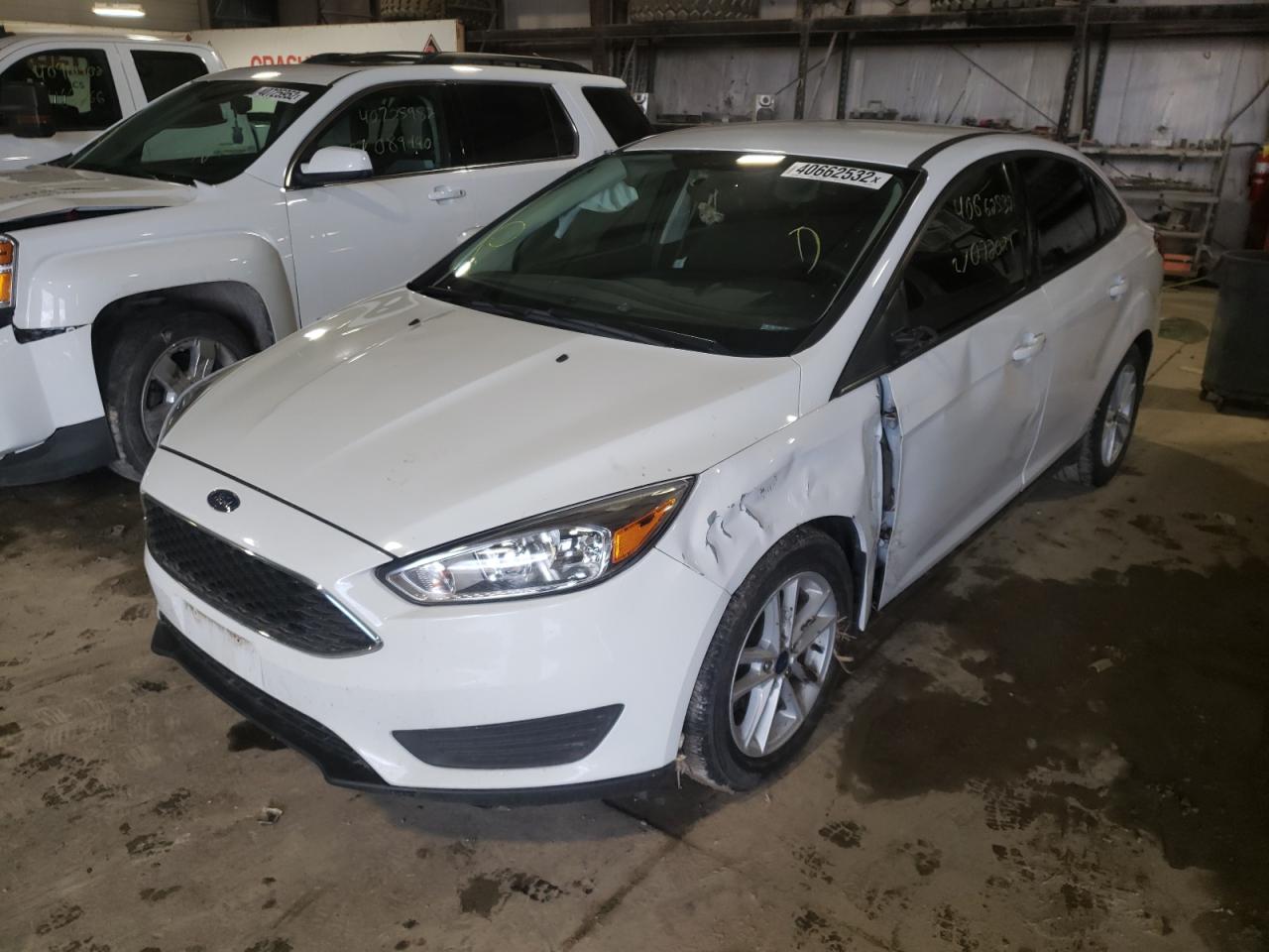 Photo 2 from auction – 2018 FORD FOCUS SE with VIN 1FADP3F26JL267155