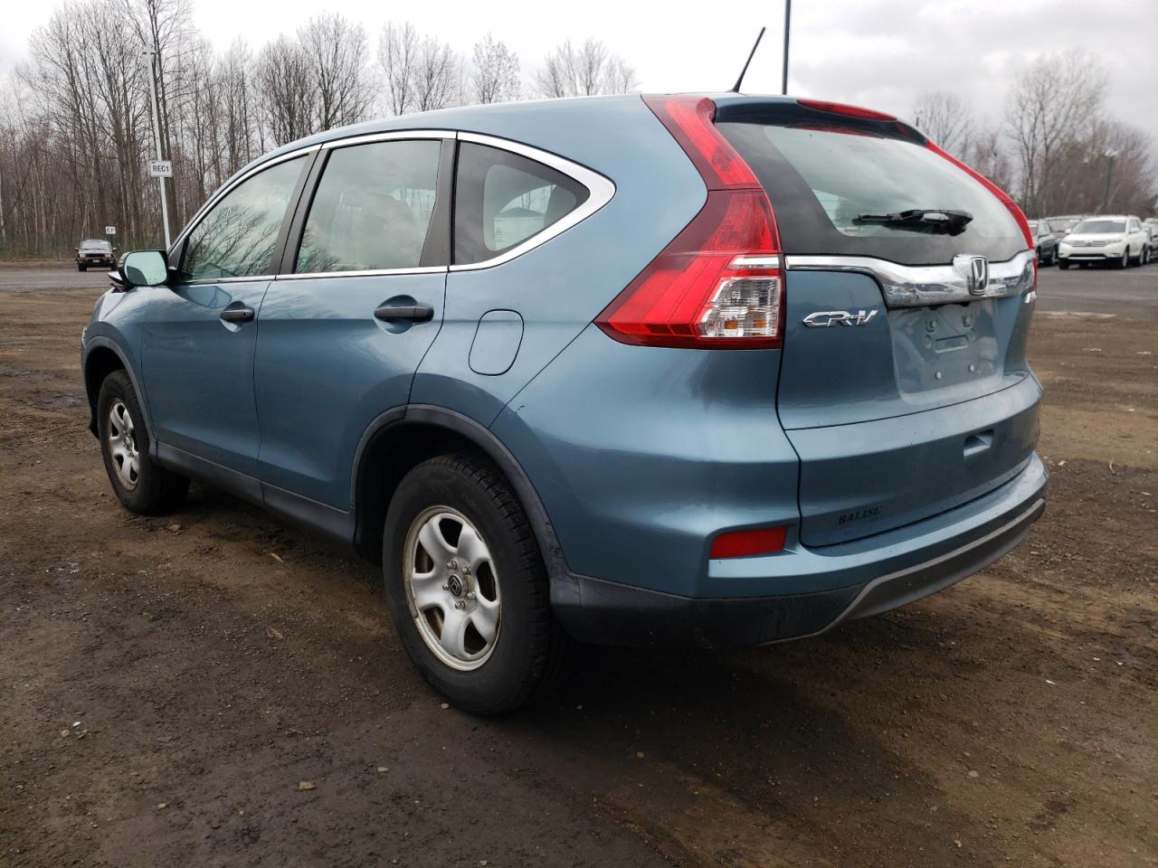 Photo 3 from auction – 2015 HONDA CR-V LX with VIN 5J6RM4H33FL083796