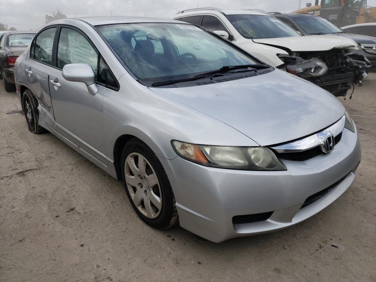 HONDA CIVIC LX 2011 with VIN 19XFA1F54BE010556 - Photo from auction