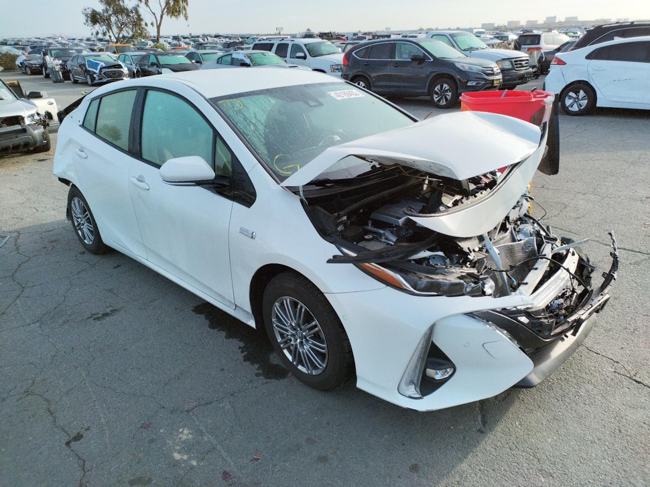TOYOTA PRIUS PRIM 2019 with VIN JTDKARFP5K3116228 - Photo from auction