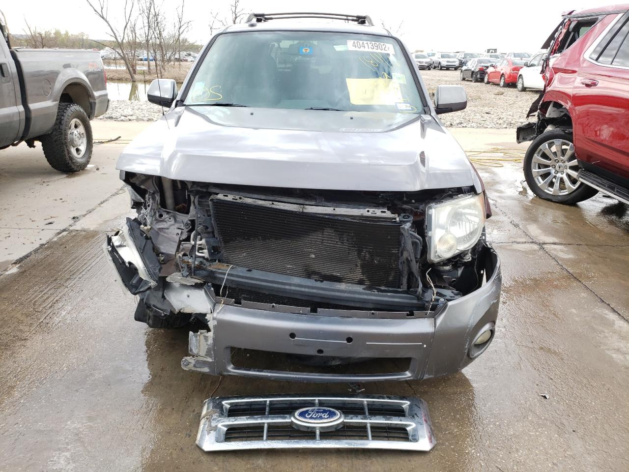 Photo 9 from auction – 2010 FORD ESCAPE LIM with VIN 1FMCU0EG2AKC05408