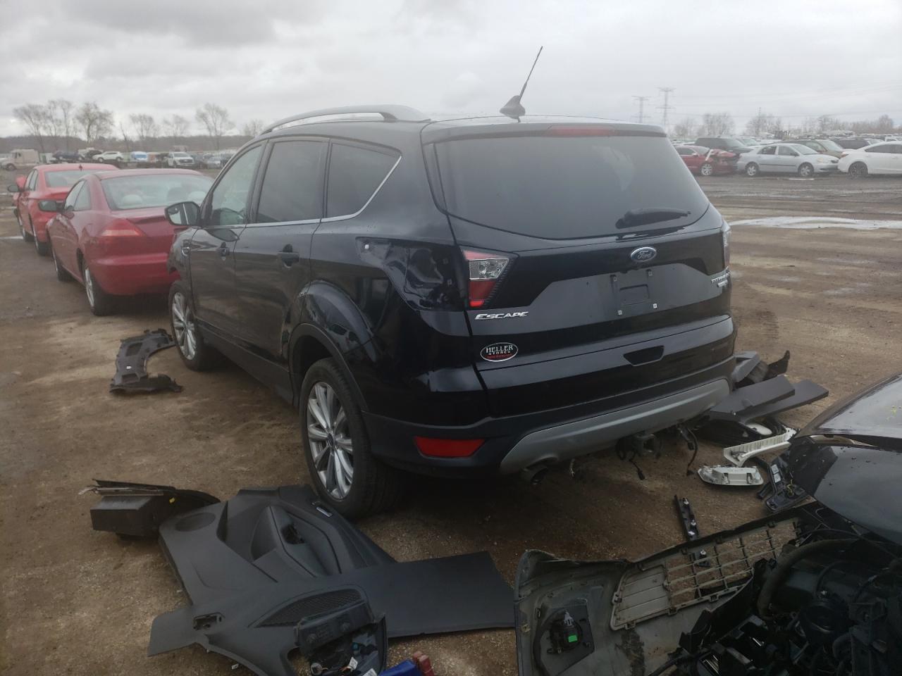 Photo 3 from auction – 2018 FORD ESCAPE TIT with VIN 1FMCU9J91JUC63932