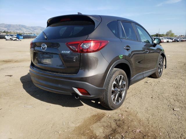 Photo 4 from auction – 2016 MAZDA CX-5 GT with VIN JM3KE2DY1G0879693
