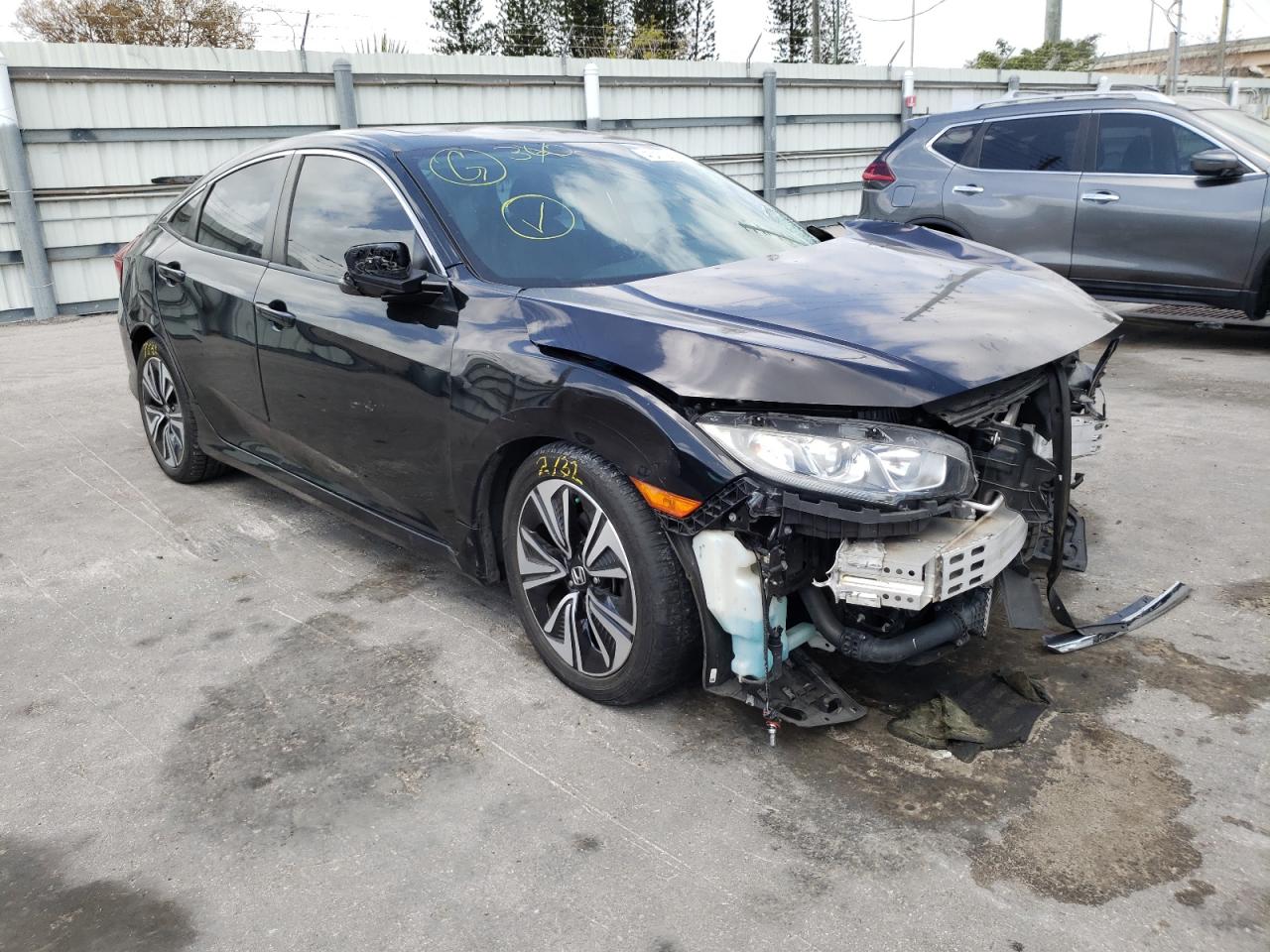 HONDA CIVIC EXL 2017 with VIN 19XFC1F75HE009310 - Photo from auction