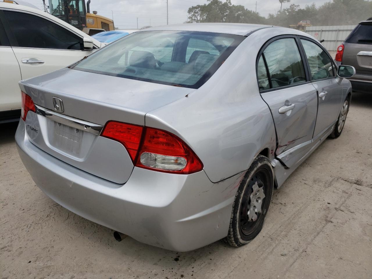 Photo 4 from auction – 2011 HONDA CIVIC LX with VIN 19XFA1F54BE010556