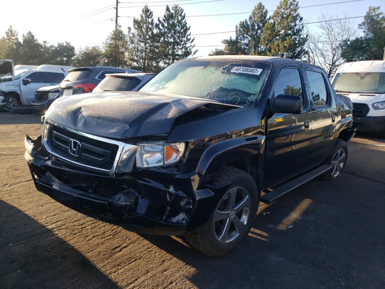 Photo 2 from auction – 2011 HONDA RIDGELINE with VIN 5FPYK1F27BB006501