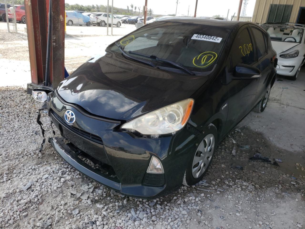 Photo 2 from auction – 2012 TOYOTA PRIUS C with VIN JTDKDTB30C1026537