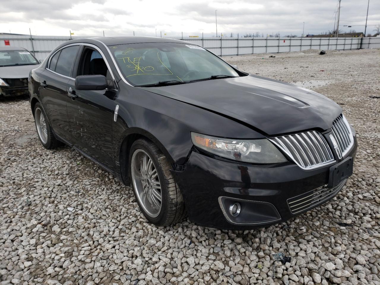LINCOLN MKS 2011 with VIN 1LNHL9FT6BG600995 - Photo from auction