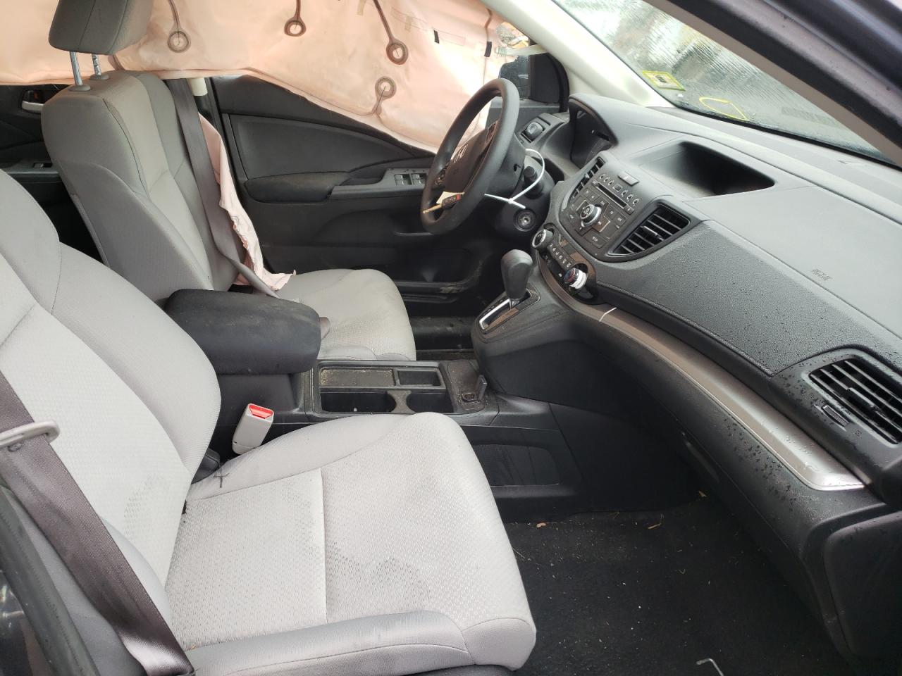 Photo 5 from auction – 2016 HONDA CR-V LX with VIN 5J6RM4H31GL121852