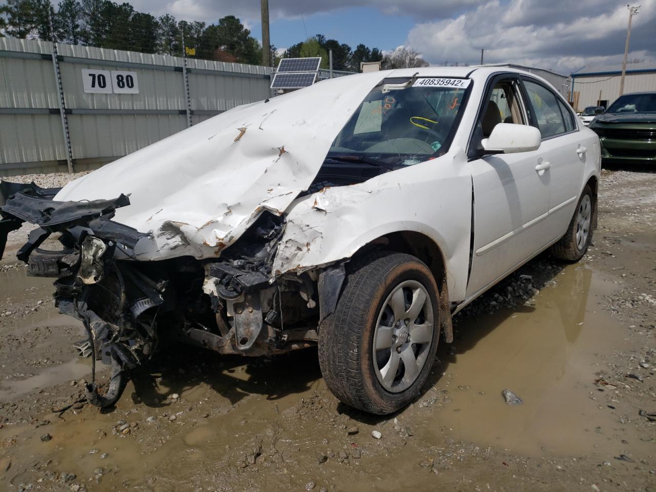 Photo 2 from auction – 2006 KIA OPTIMA LX with VIN KNAGE123165073206