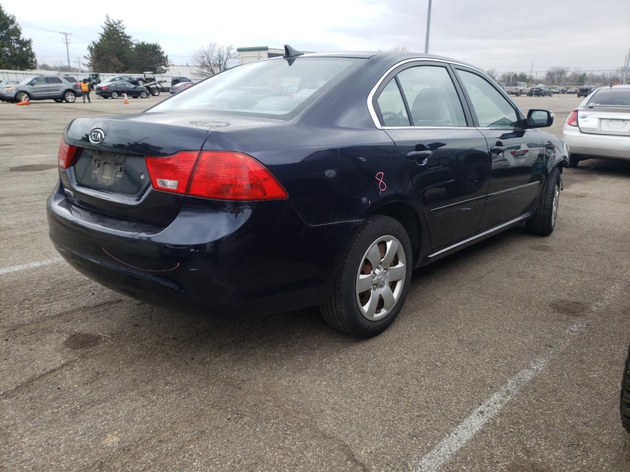 Photo 4 from auction – 2009 KIA OPTIMA LX with VIN KNAGE228095306904