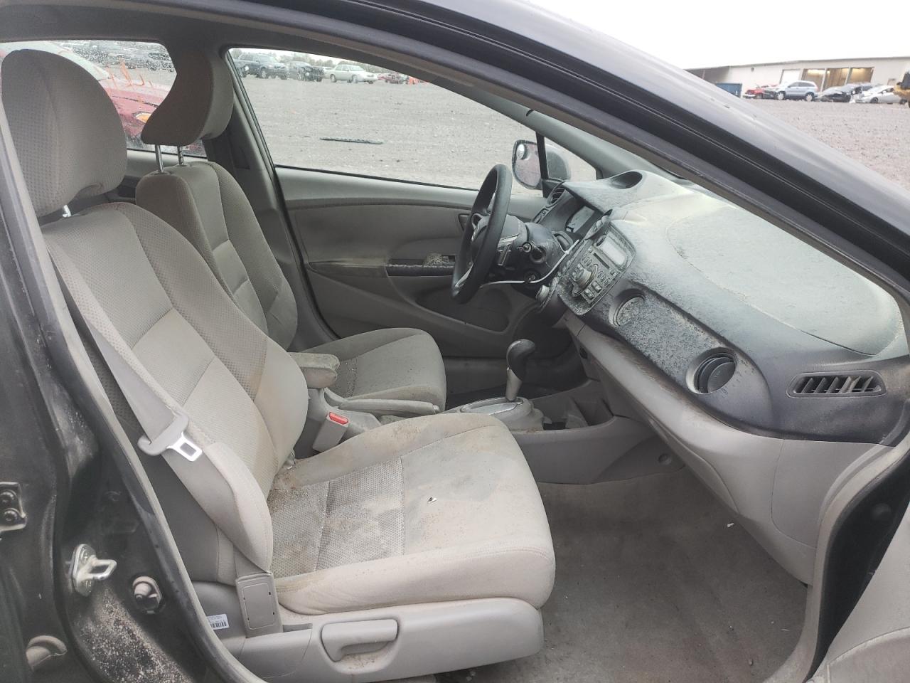 Photo 9 from auction – 2010 HONDA INSIGHT EX with VIN JHMZE2H74AS037613
