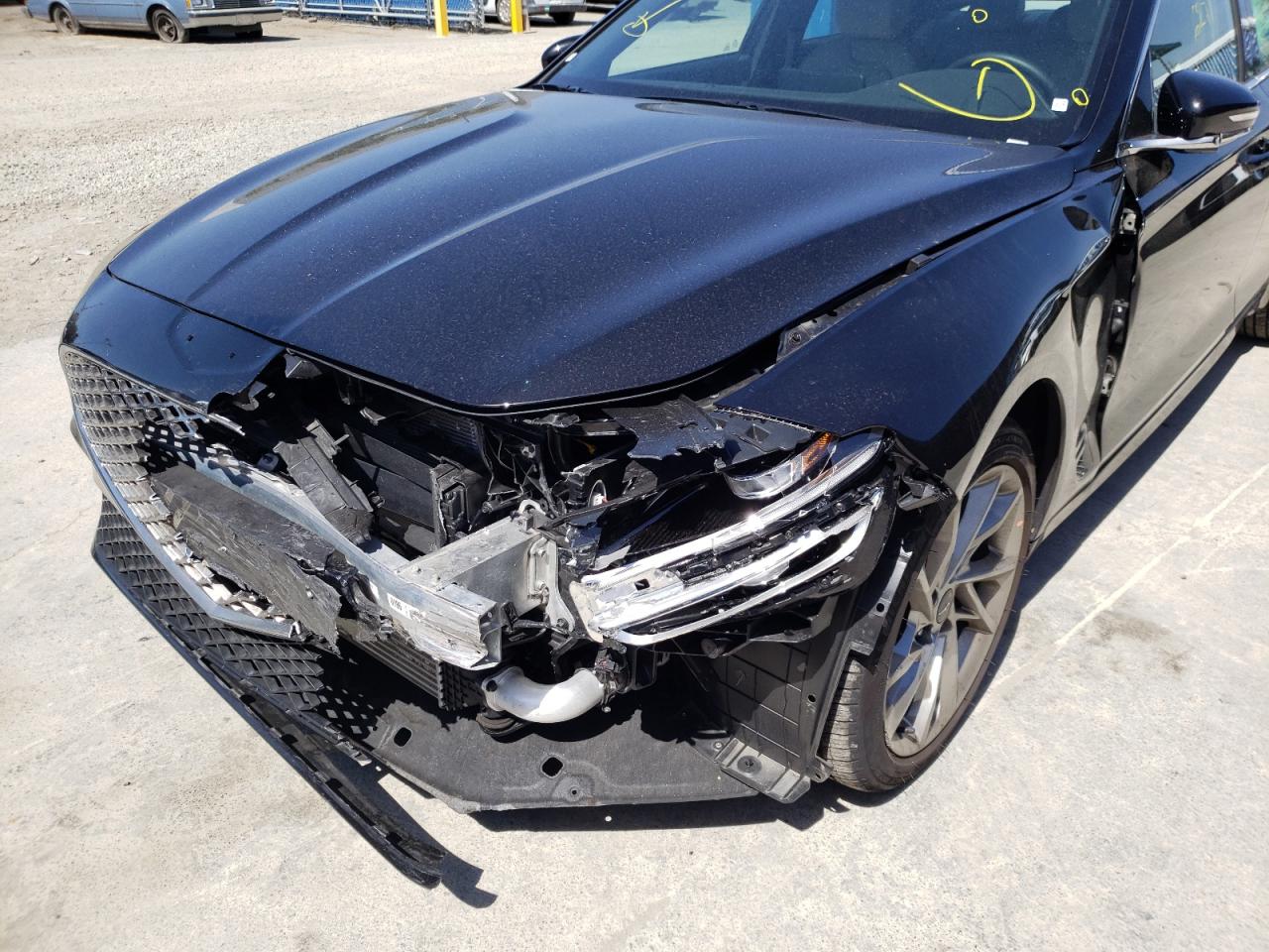 Photo 9 from auction – 2022 GENESIS G70 BASE with VIN KMTG34TA3NU094376