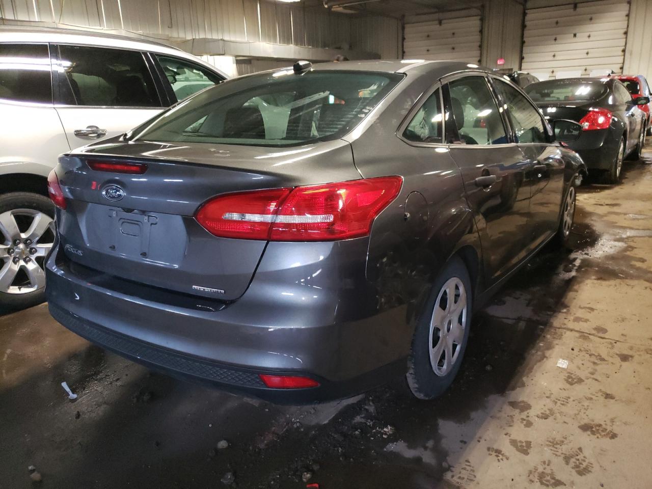 Photo 4 from auction – 2015 FORD FOCUS S with VIN 1FADP3E23FL270426