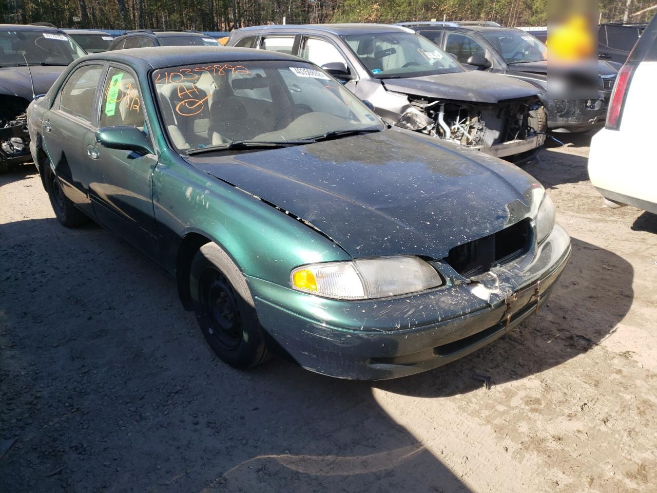 MAZDA 626 ES 1999 with VIN 1YVGF22C2X5857427 - Photo from auction