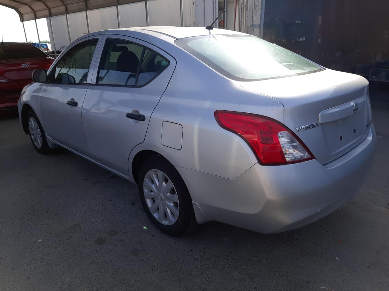 Photo 3 from auction – 2012 NISSAN VERSA S with VIN 3N1CN7AP6CL888881