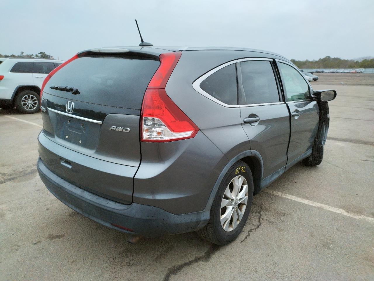 Photo 4 from auction – 2012 HONDA CR-V EXL with VIN JHLRM4H76CC004824