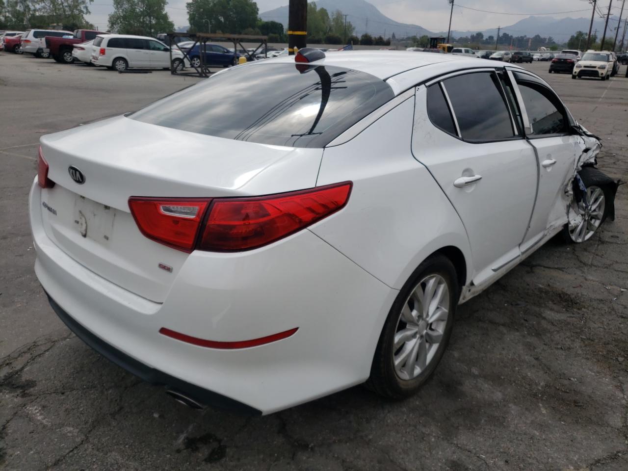 Photo 4 from auction – 2015 KIA OPTIMA LX with VIN 5XXGM4A75FG451552