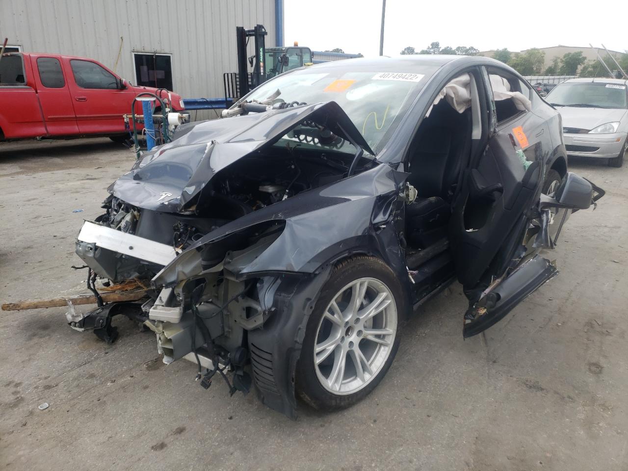 Photo 2 from auction – 2021 TESLA MODEL Y with VIN 5YJYGDED4MF106119
