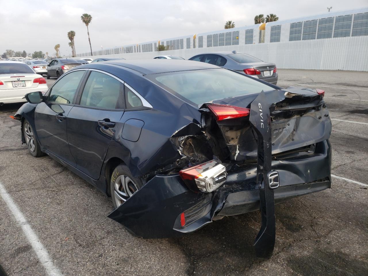 Photo 3 from auction – 2017 HONDA CIVIC LX with VIN 19XFC2F54HE207140