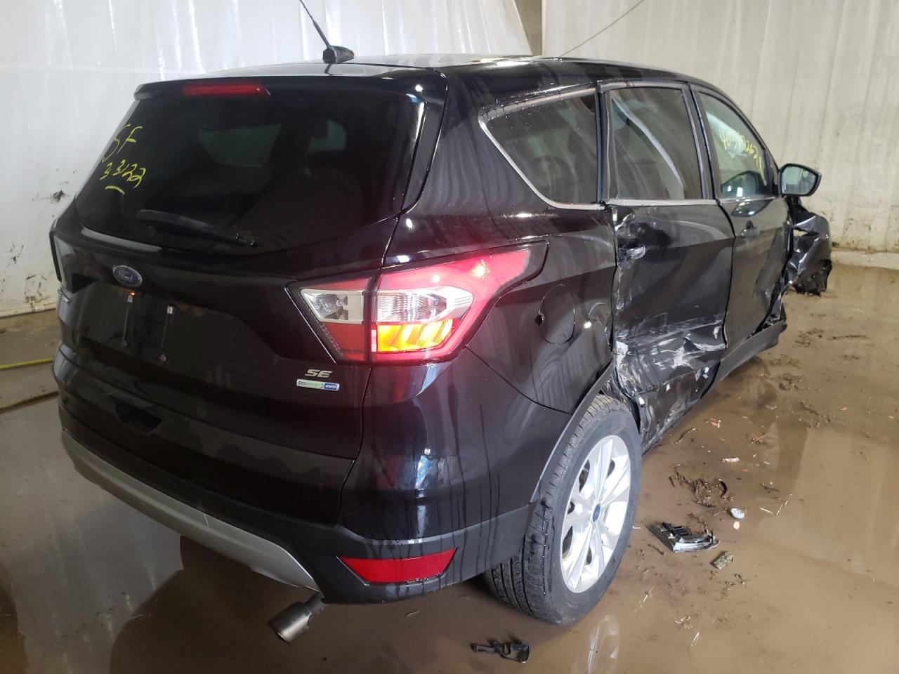 Photo 4 from auction – 2017 FORD ESCAPE SE with VIN 1FMCU9GD3HUB72196