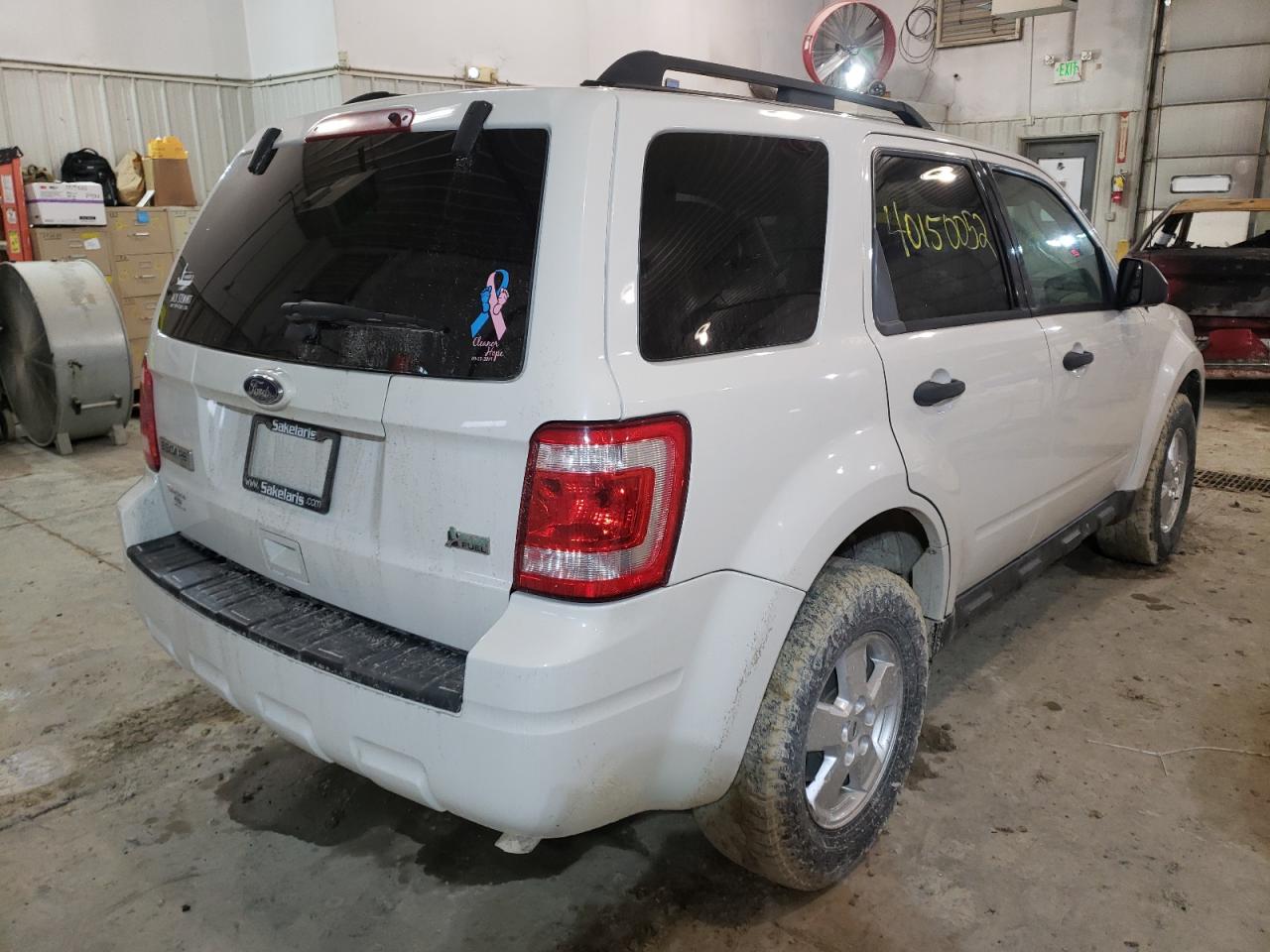 Photo 4 from auction – 2010 FORD ESCAPE XLT with VIN 1FMCU0DG2AKA93159