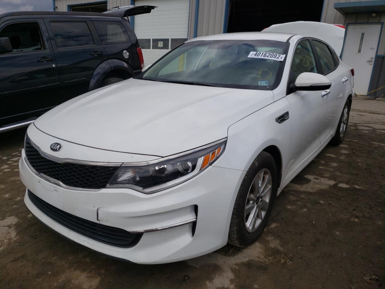 Photo 2 from auction – 2016 KIA OPTIMA LX with VIN 5XXGT4L39GG075422