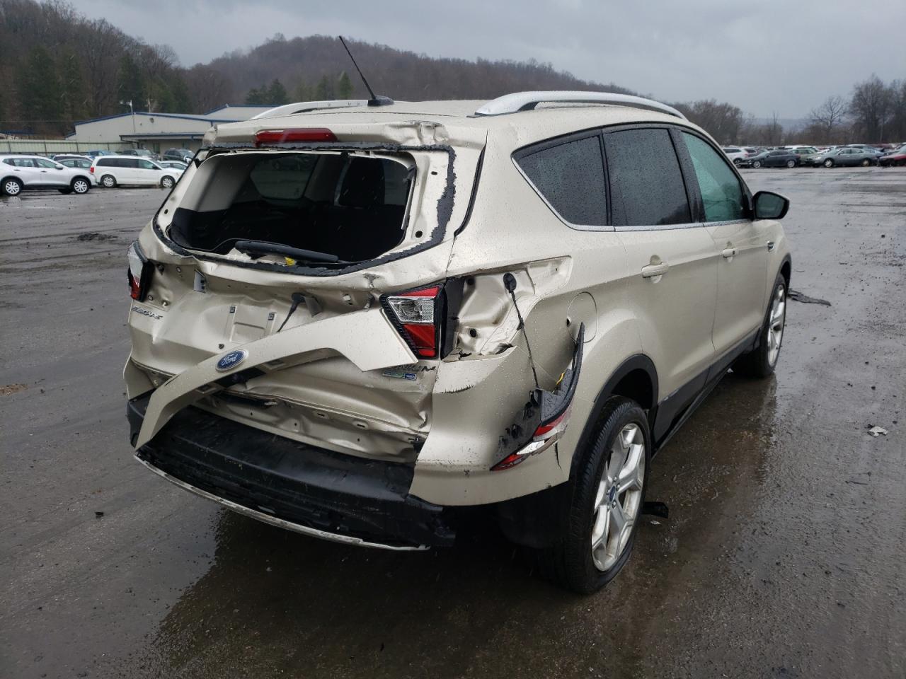 Photo 4 from auction – 2017 FORD ESCAPE TIT with VIN 1FMCU9J97HUF03673