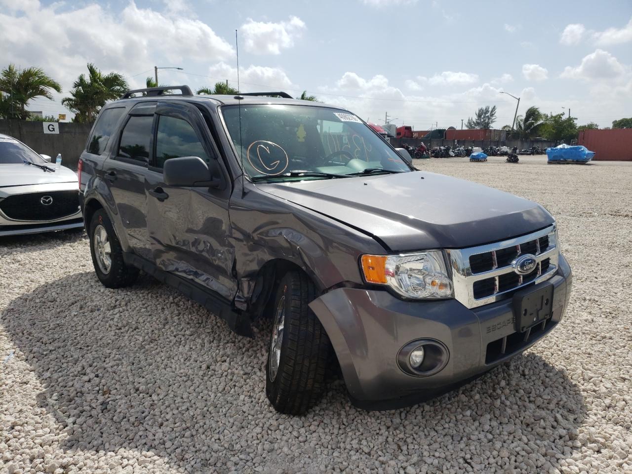FORD ESCAPE XLT 2009 with VIN 1FMCU93G19KC30142 - Photo from auction