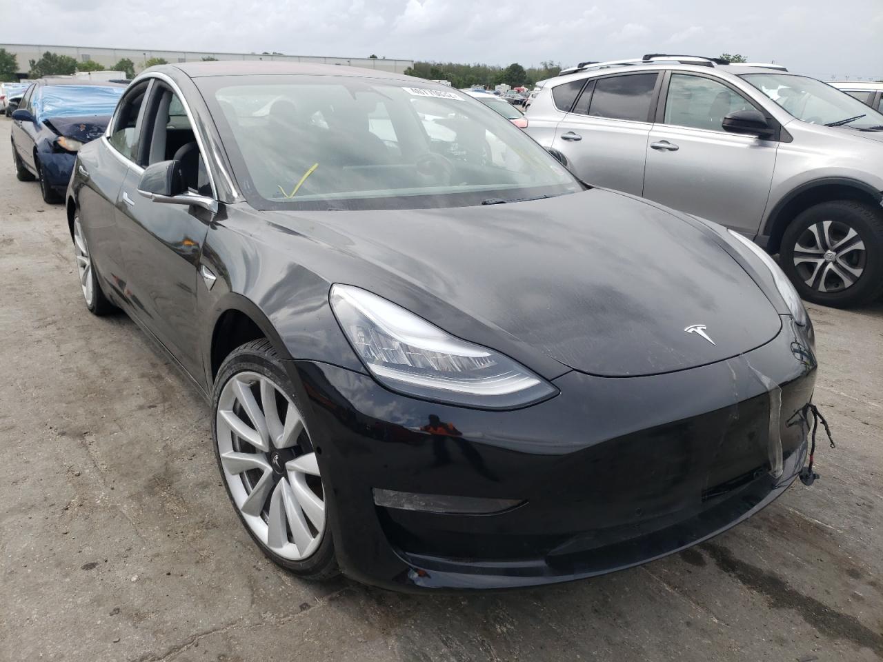 TESLA MODEL 3 2018 with VIN 5YJ3E1EA6JF019791 - Photo from auction