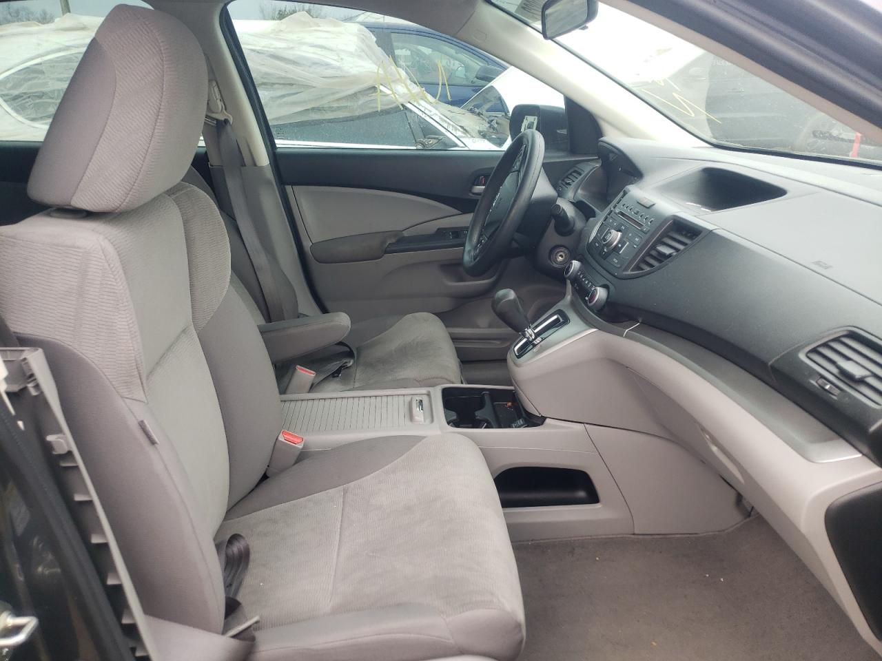 Photo 5 from auction – 2012 HONDA CR-V LX with VIN 5J6RM3H3XCL030762