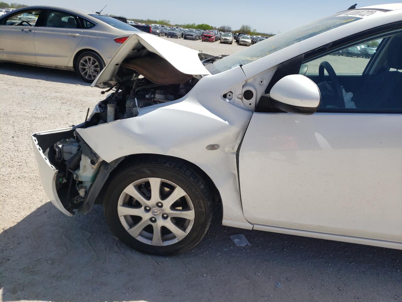 Photo 9 from auction – 2011 MAZDA MAZDA2 with VIN JM1DE1HZ1B0116936