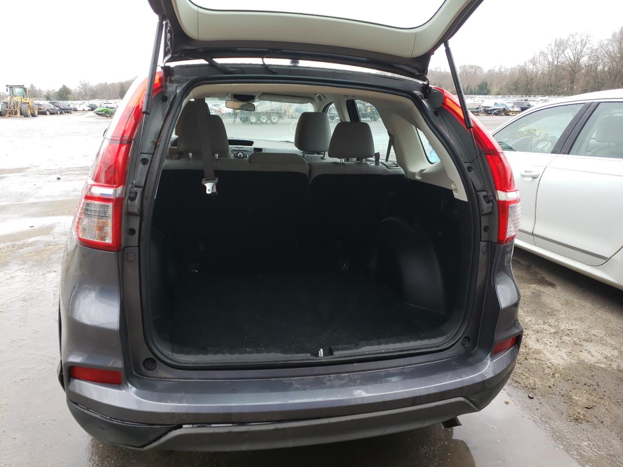 Photo 9 from auction – 2016 HONDA CR-V LX with VIN 5J6RM4H31GL121852
