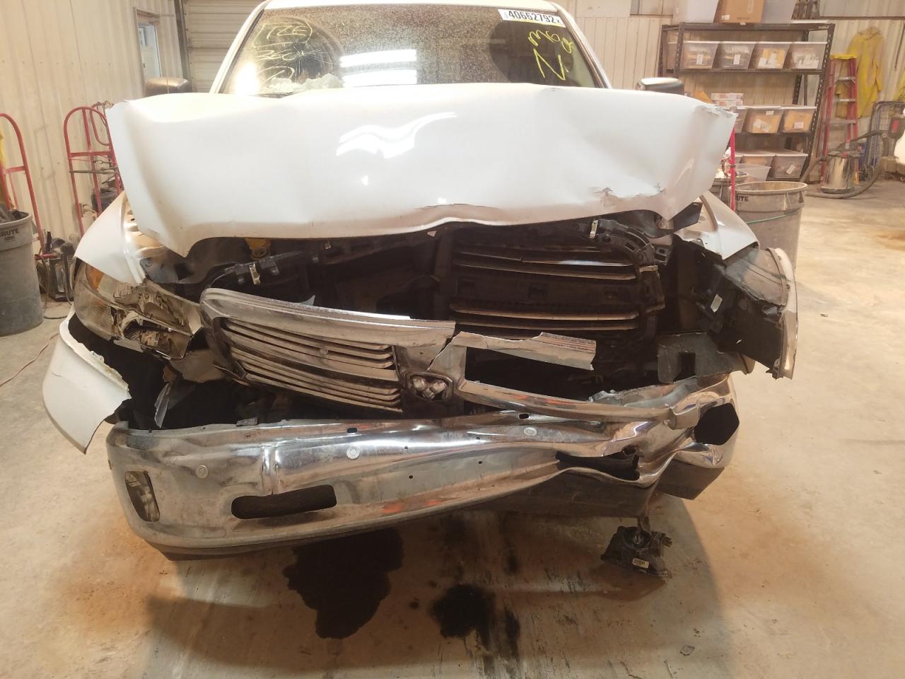 Photo 9 from auction – 2014 RAM 1500 SLT with VIN 1C6RR7LT4ES468568