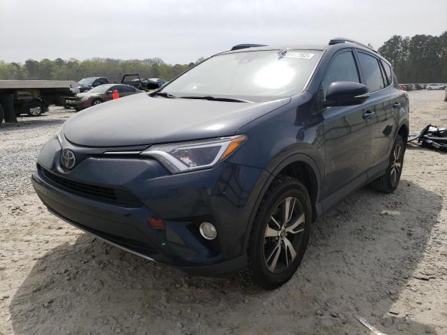 Photo 2 from auction – 2018 TOYOTA RAV4 with VIN JTMWFREV5JJ172909