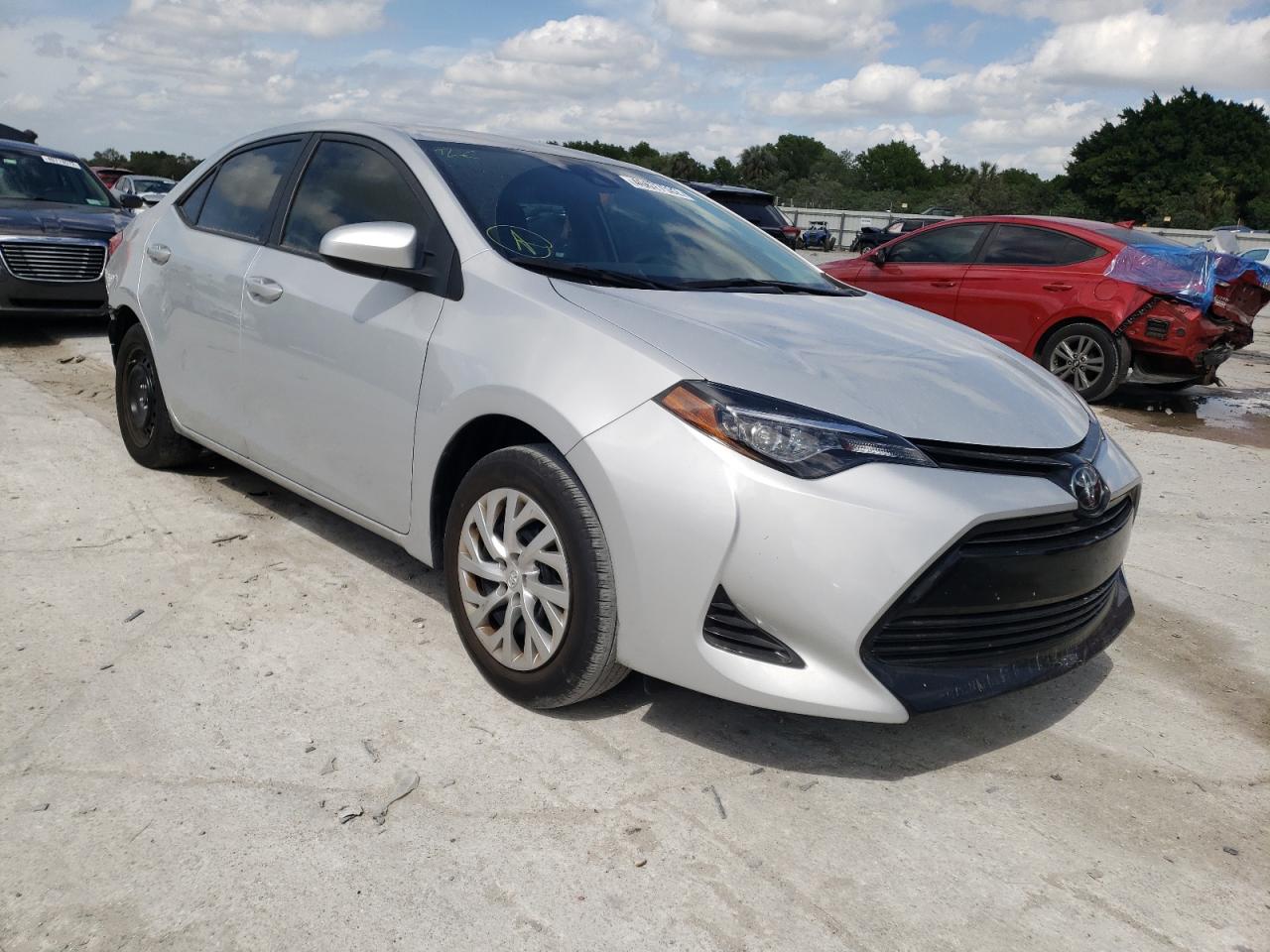 TOYOTA COROLLA L 2019 with VIN 2T1BURHE9KC165247 - Photo from auction