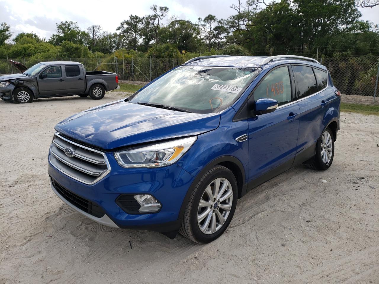 Photo 2 from auction – 2017 FORD ESCAPE TIT with VIN 1FMCU0JD5HUC31754