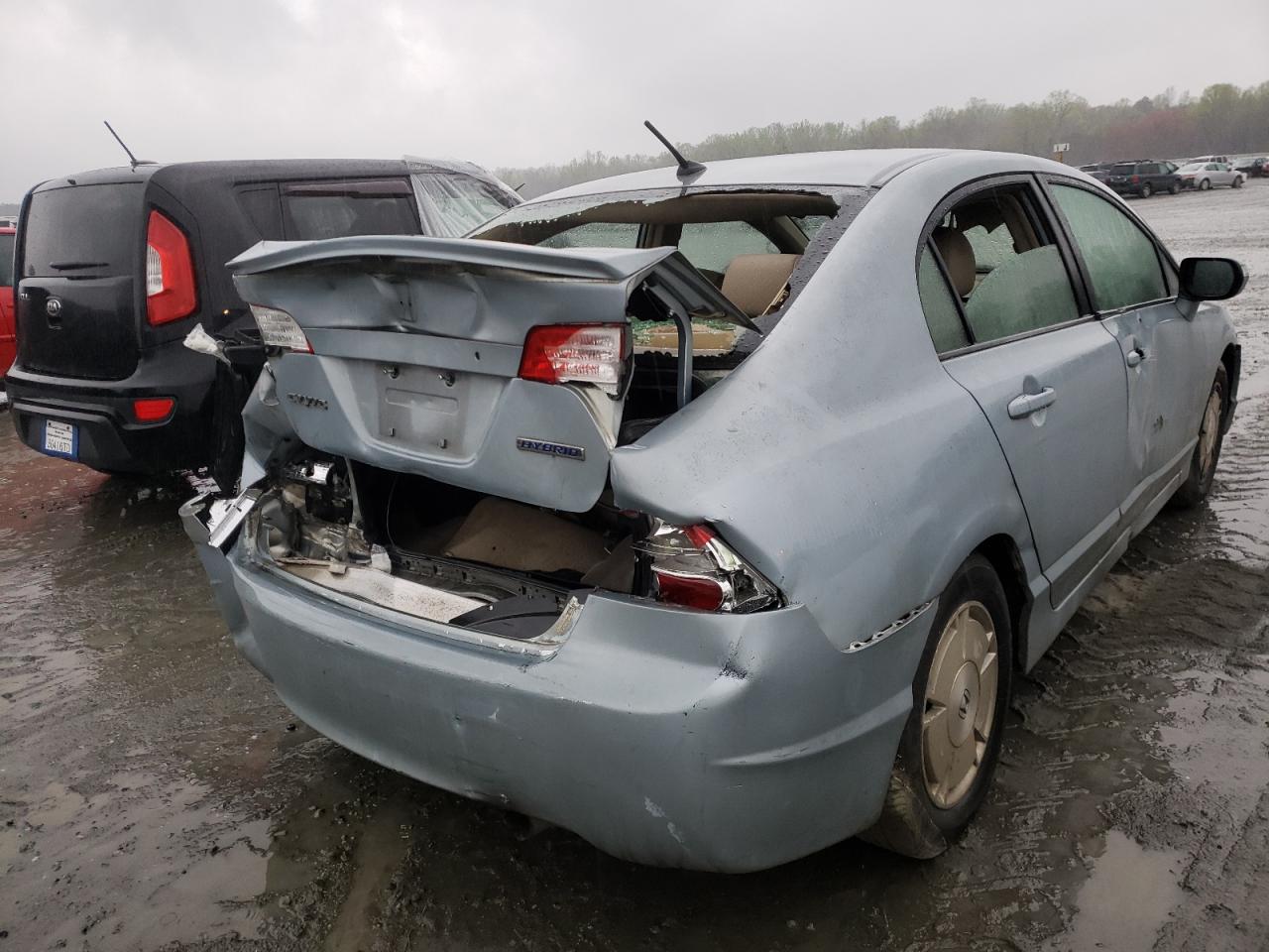 Photo 4 from auction – 2006 HONDA CIVIC HYBR with VIN JHMFA36256S004719