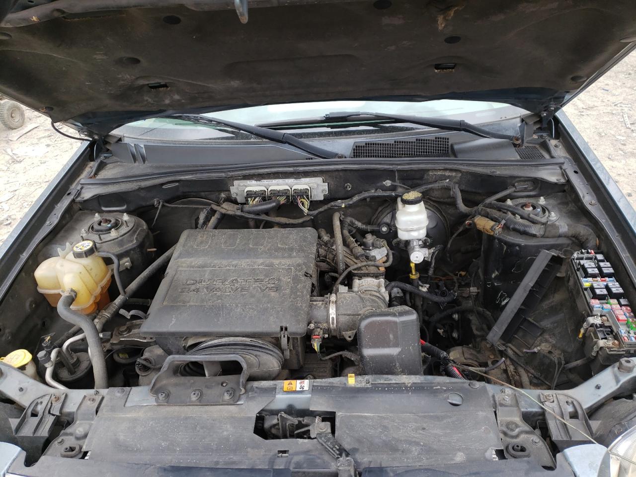 Photo 7 from auction – 2010 MERCURY MARINER PR with VIN 4M2CN9HG4AKJ15477