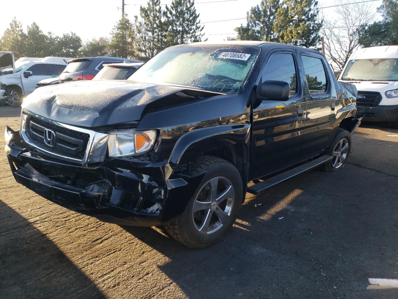 Photo 9 from auction – 2011 HONDA RIDGELINE with VIN 5FPYK1F27BB006501