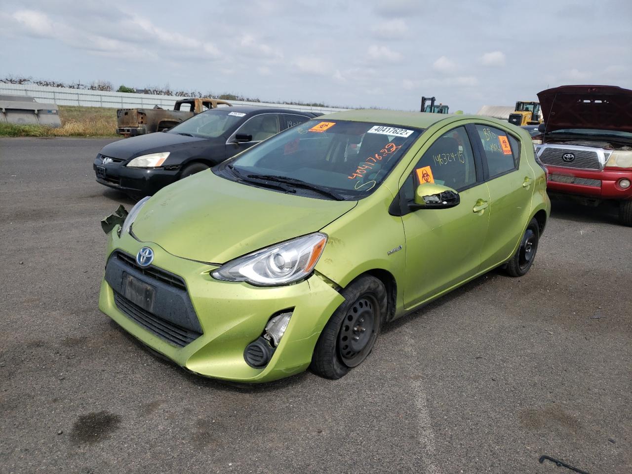 Photo 2 from auction – 2015 TOYOTA PRIUS C with VIN JTDKDTB39F1103538