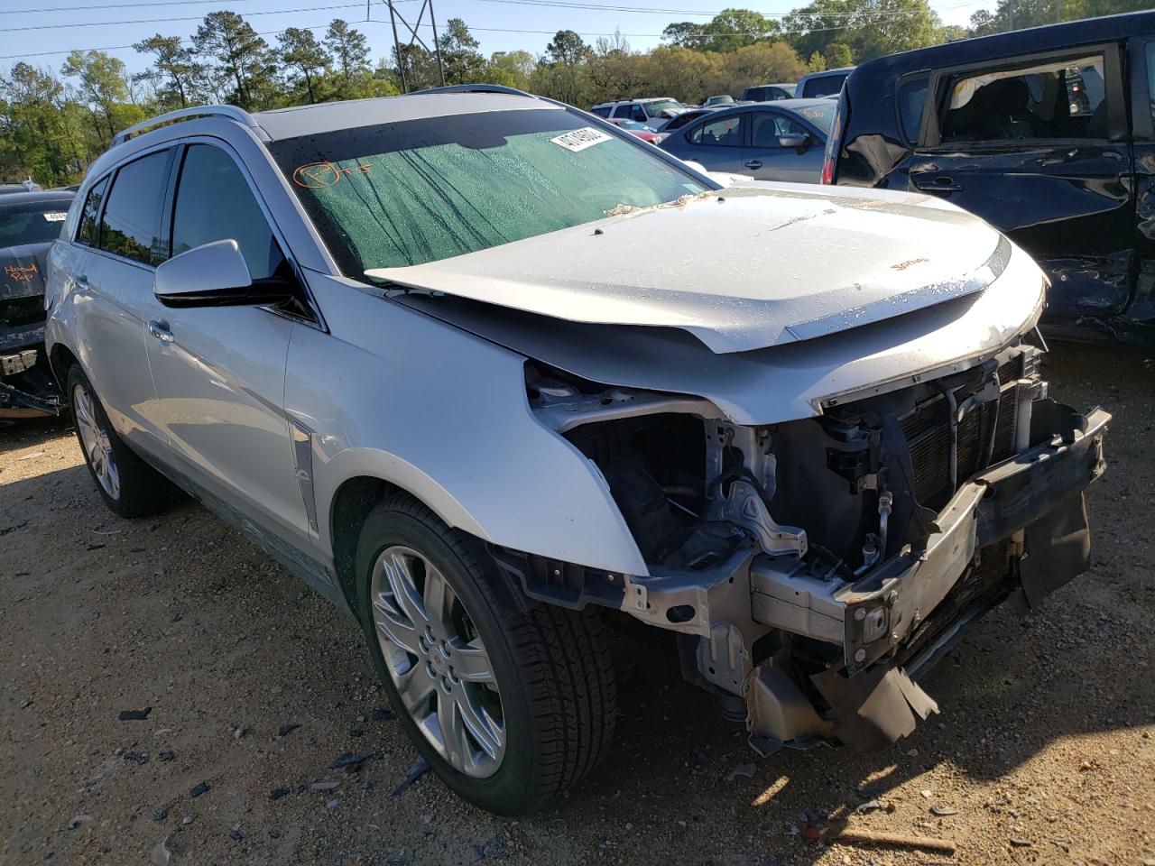 CADILLAC SRX PERFOR 2012 with VIN 3GYFNBE34CS503760 - Photo from auction