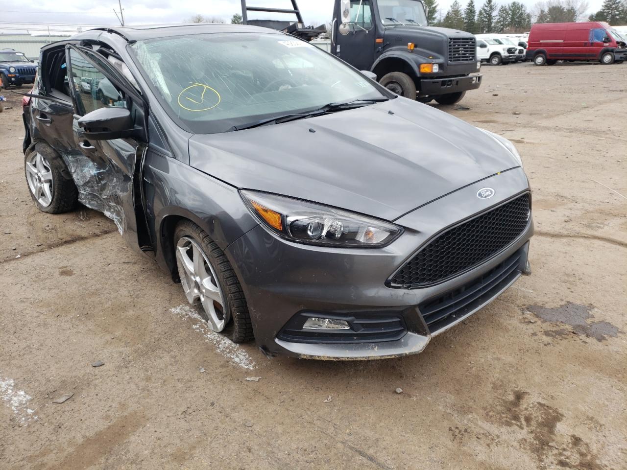 FORD FOCUS ST 2017 with VIN 1FADP3L94HL207855 - Photo from auction