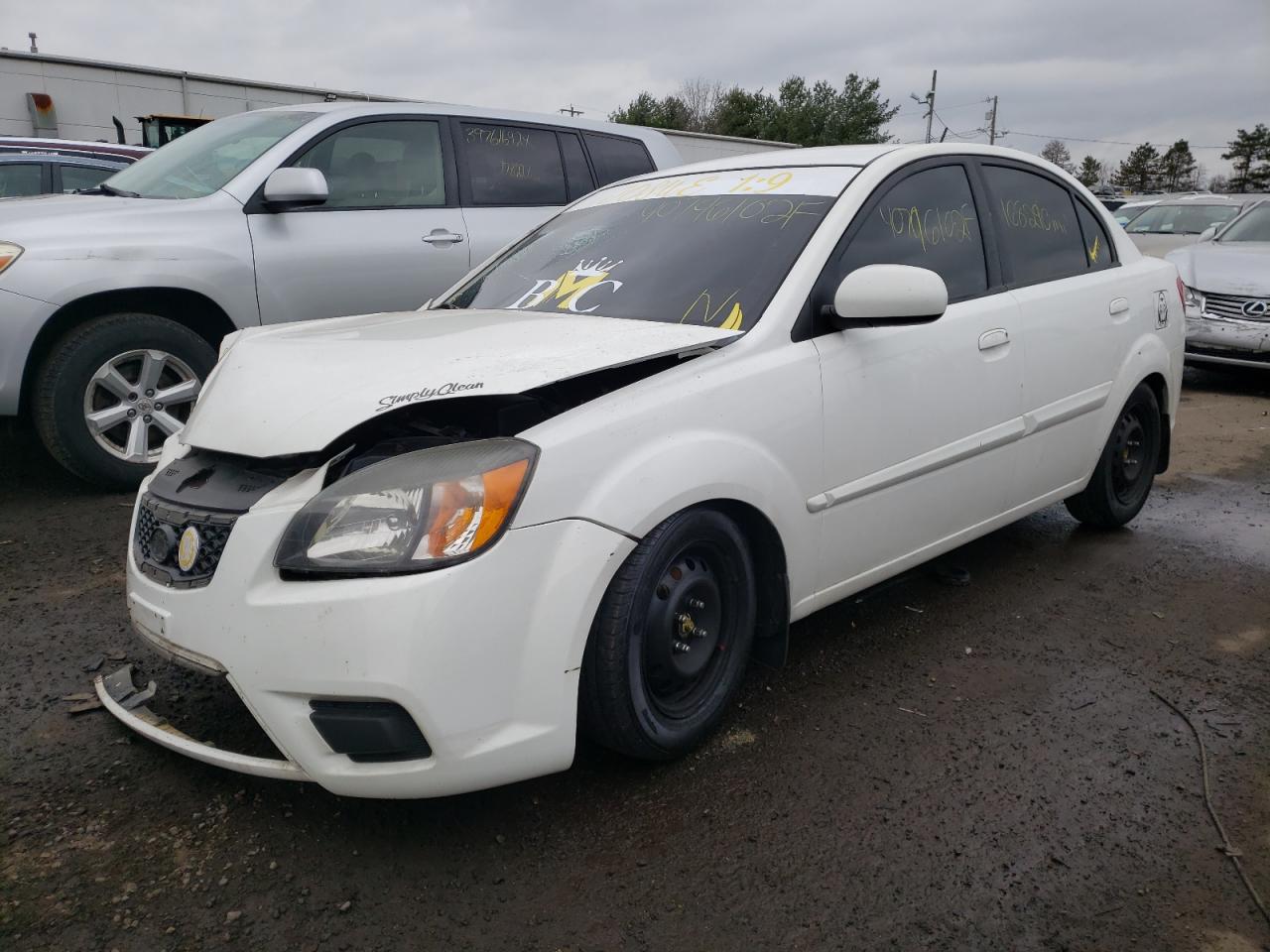 Photo 2 from auction – 2011 KIA RIO BASE with VIN KNADH4A38B6925200