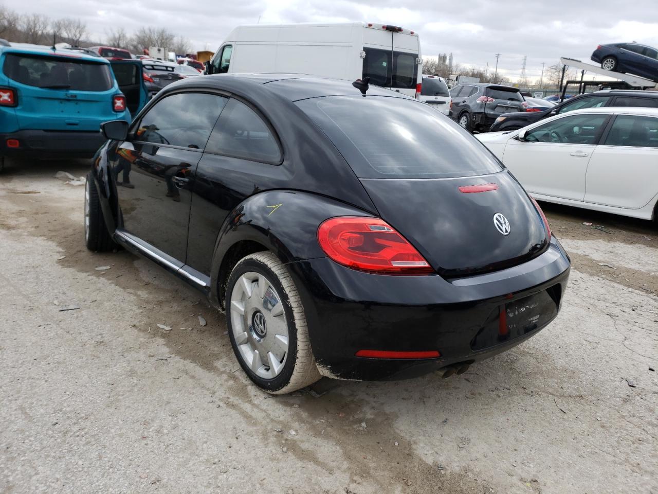Photo 3 from auction – 2013 VOLKSWAGEN BEETLE with VIN 3VWJP7AT5DM612549