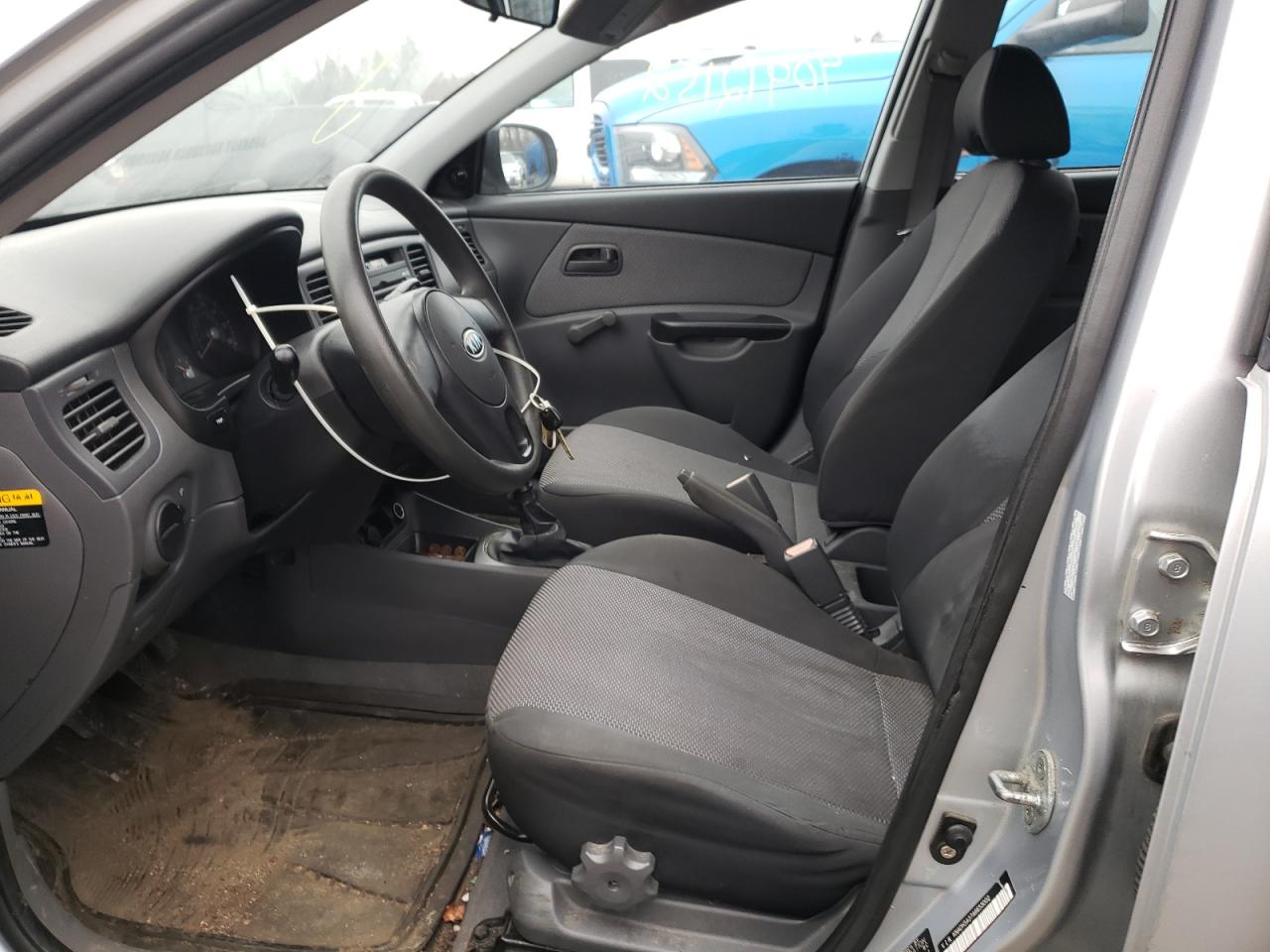 Photo 5 from auction – 2010 KIA RIO LX with VIN KNADH5A37A6653002